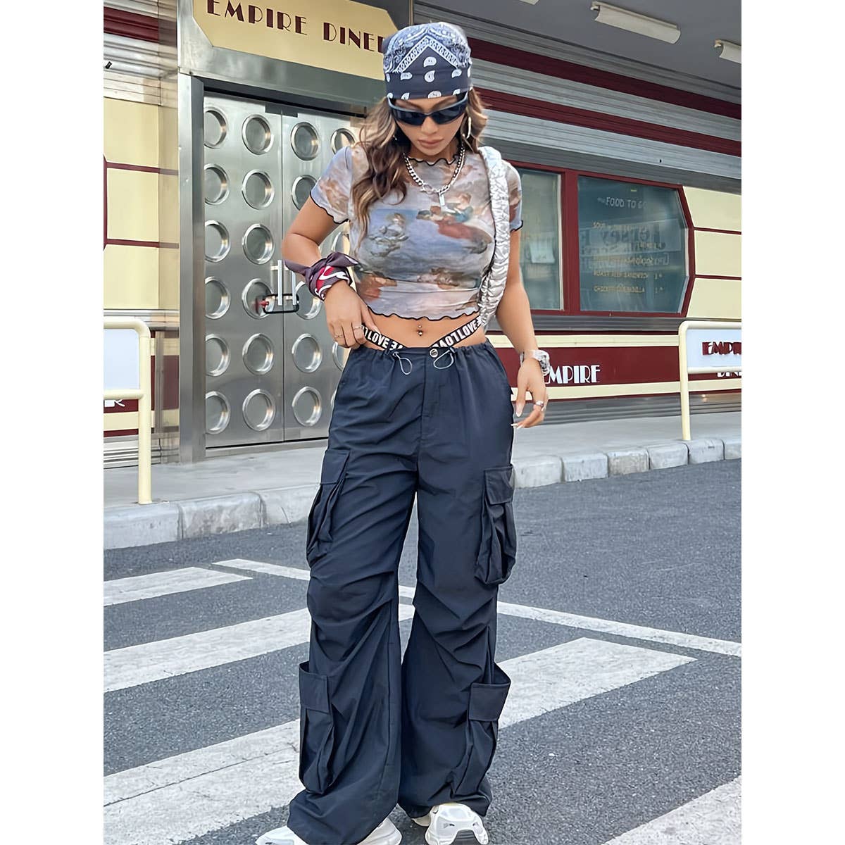 FLORAL PRINT MESH TOP WITH RUFFLE DETAILING_CWTBLS1510