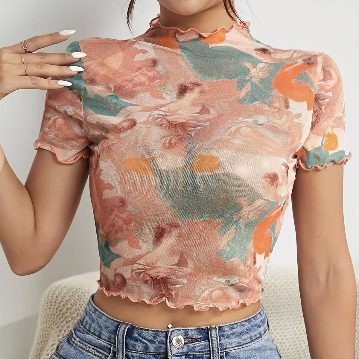 FLORAL PRINT MESH TOP WITH RUFFLE DETAILING_CWTBLS1510