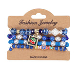 CHERRY BUTTERFLY CHARM LAYERED BRACELET_CWAJE2227