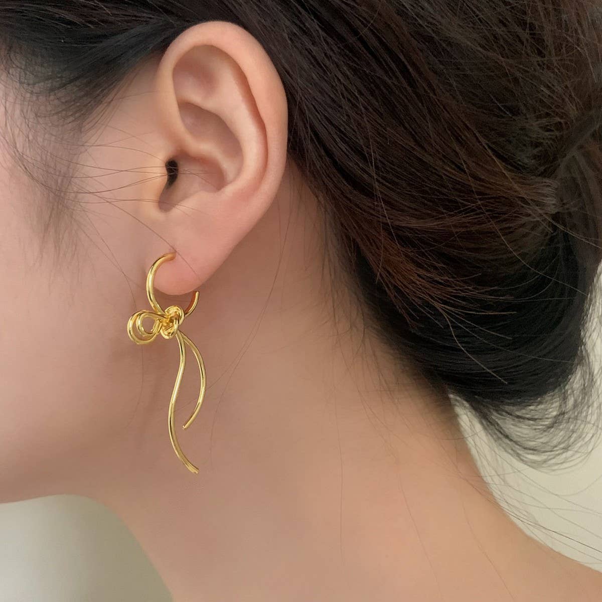 FASHIONABLE HIGH GRADE METAL BOW PENDANT EARRINGS_CWAJE2997