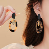 LEOPARD PRINT OVAL LETTER TREND EARRINGS_CWASC1331