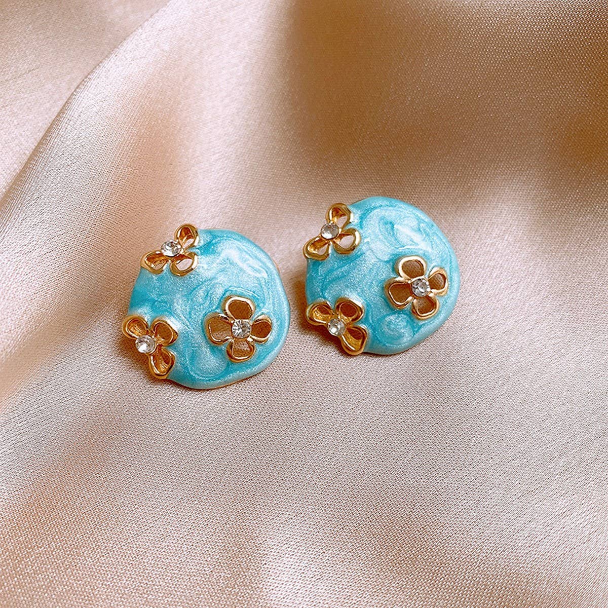 ROUND HOLLOW FLOWER FASHION EARRINGS_CWASC1329