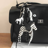 CUTE LEATHER PEGASUS CHARM WITH BRAIDED STRAP_CWMM7559