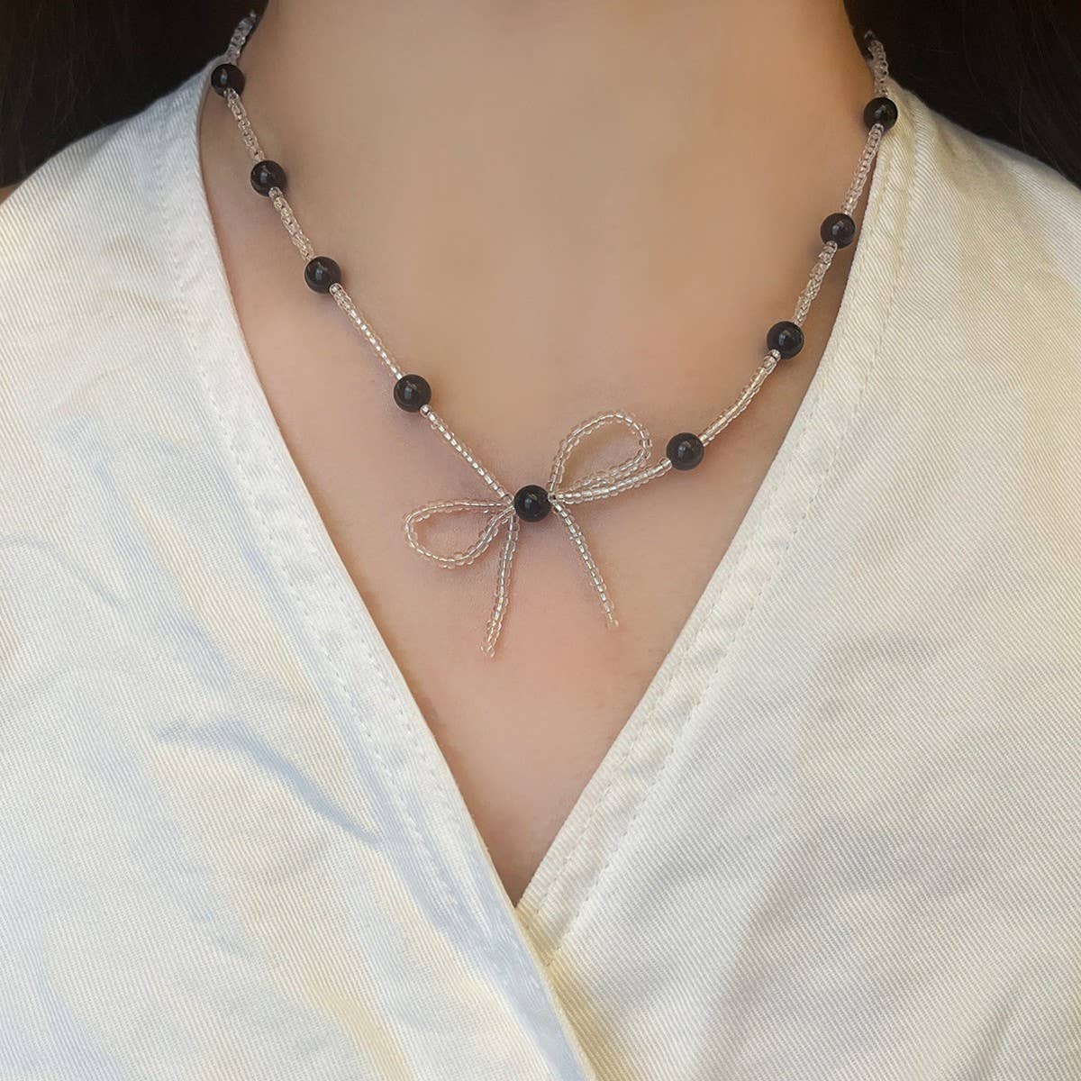 ELEGANT AND FRESH BOW BEADED PEARL NECKLACE_CWAJE3057