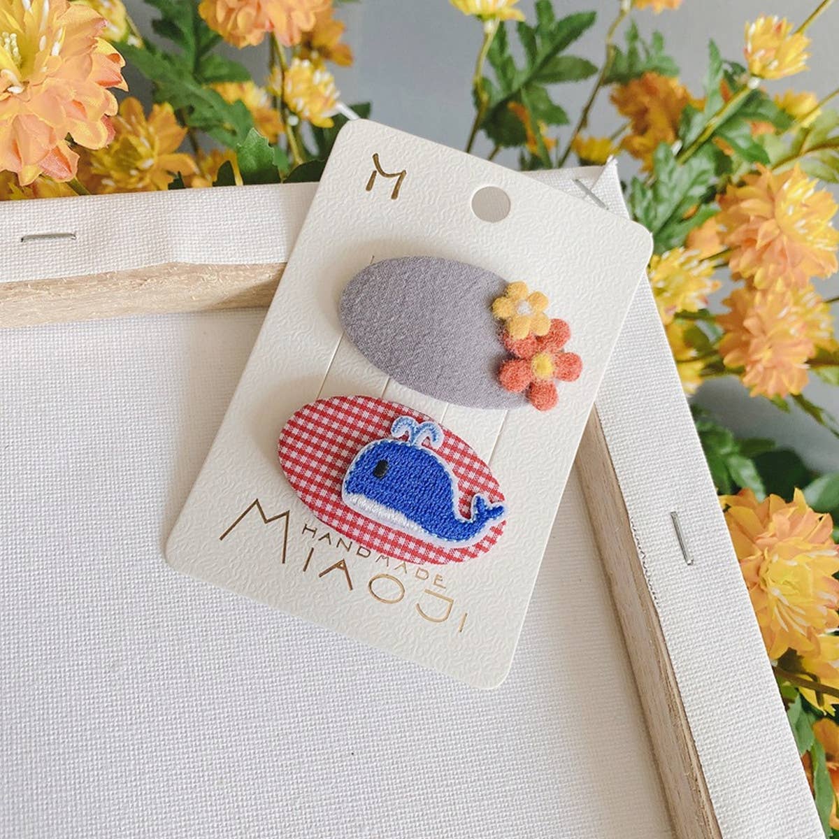 CHILDRENS OVAL EMBROIDERED PATCH HAIRPIN_CWAHA1845