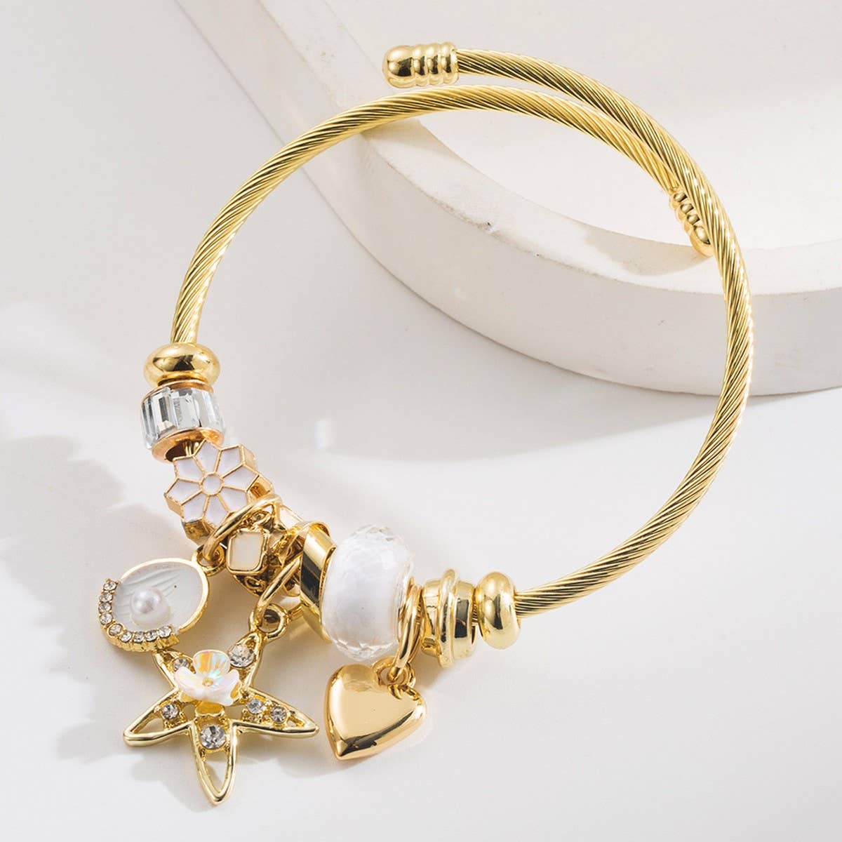 STAR SHELL CHARM ADJUSTABLE STAINLESS BRACELET_CWMM8494