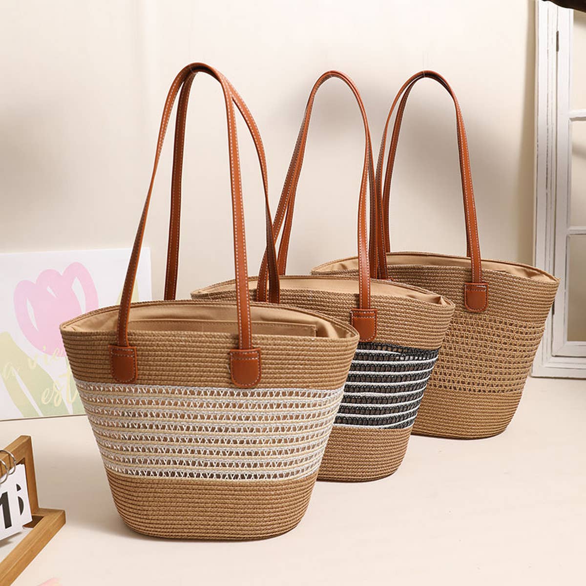 HOLLOW STRIPED ONE SHOULDER BEACH STRAW BAG_CWAB1867