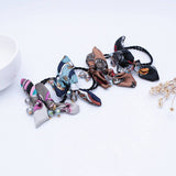 SIMPLE PEARL BOW HAIR TIE_CWAHA1074