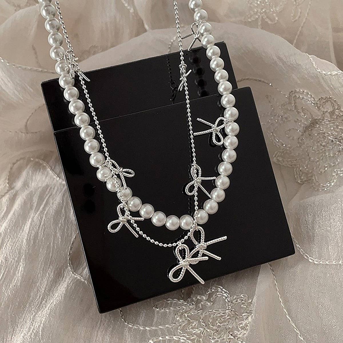 Womens Temperament Metal Bow Tassel Necklace