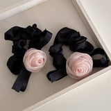 PURE DESIRE PEARLESCENT PINK ROSE BOW HAIRBAND_CWAHA4688