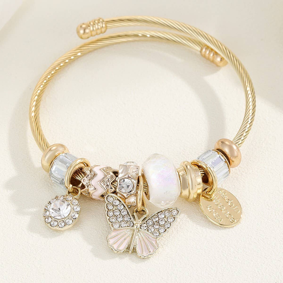 ALLOY STAINLESS STEEL BRACELET WITH SHELL BUTTERFLY_CWMM8594