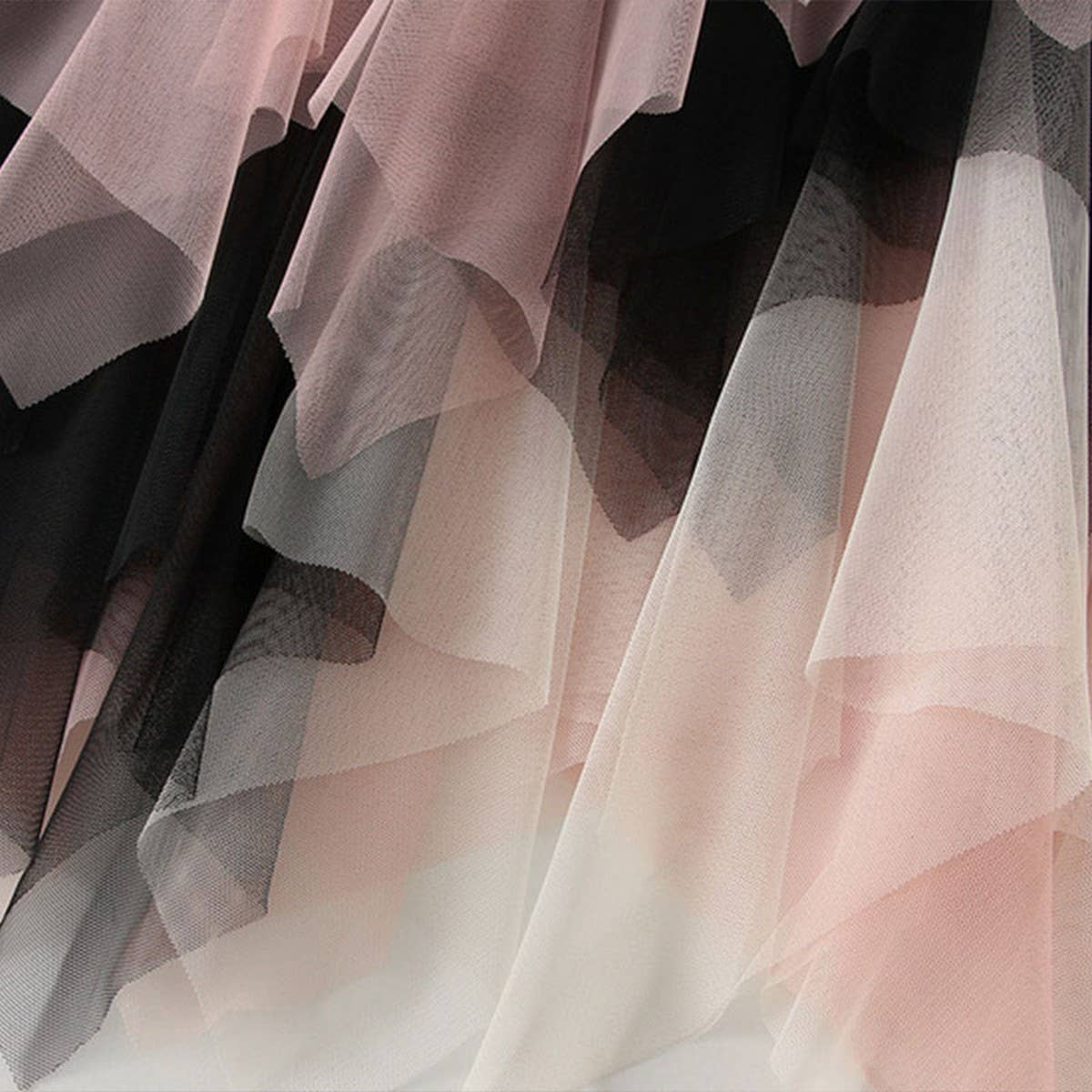 COLORBLOCK LAYERED TULLE IRREGULAR MIDI SKIRT_CWBMS0385
