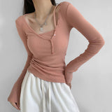 Two Button-Up Long-Sleeved T-Shirts