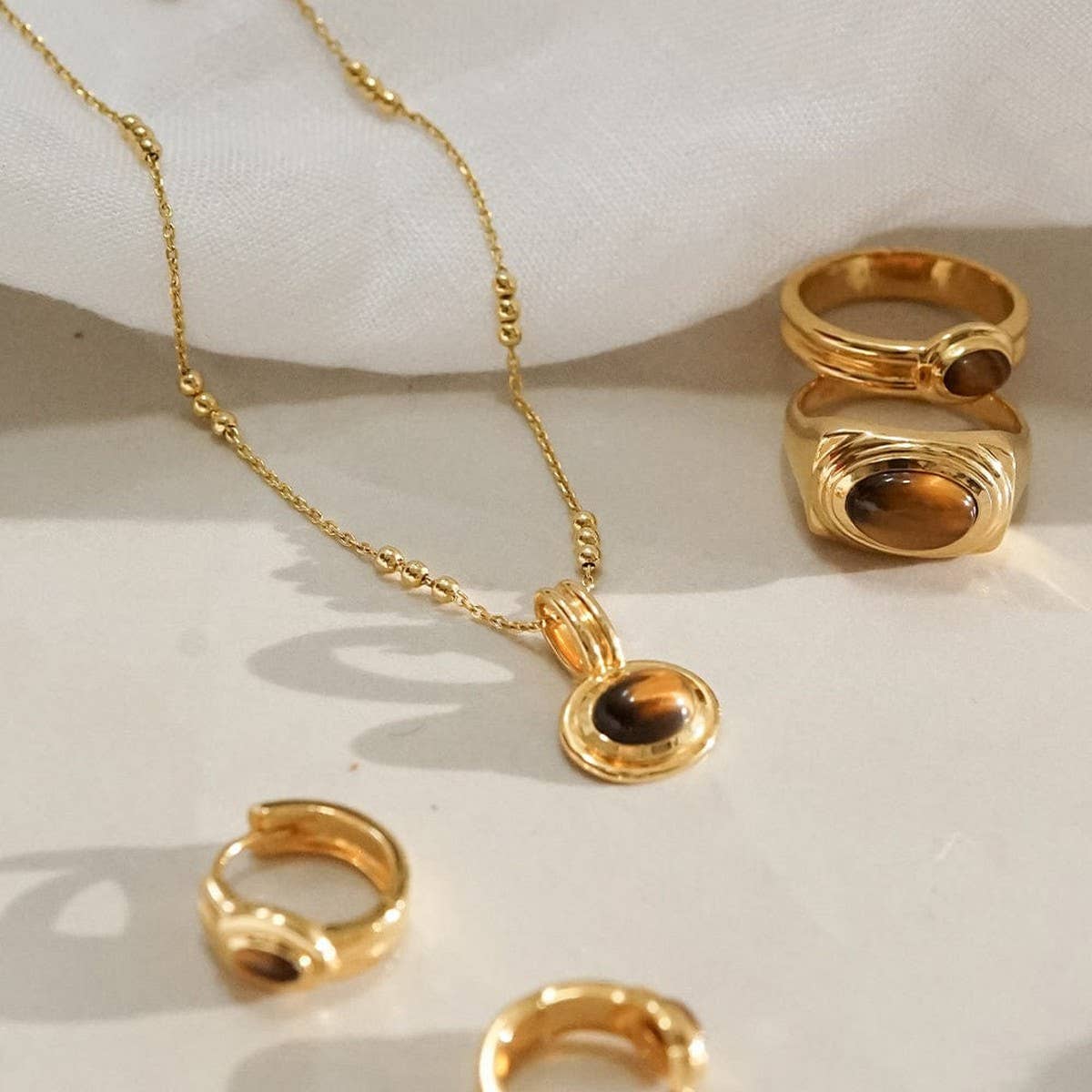 STAINLESS STEEL MULTI LAYERED GEMSTONE NECKLACE_CWMM5733