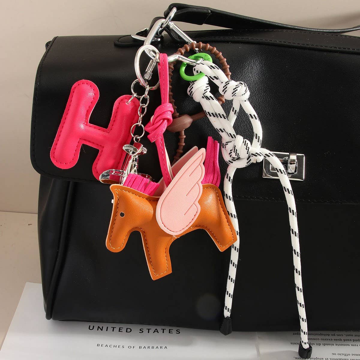 LEATHER PEGASUS PLANE LETTER BAG CHARM_CWMM7566