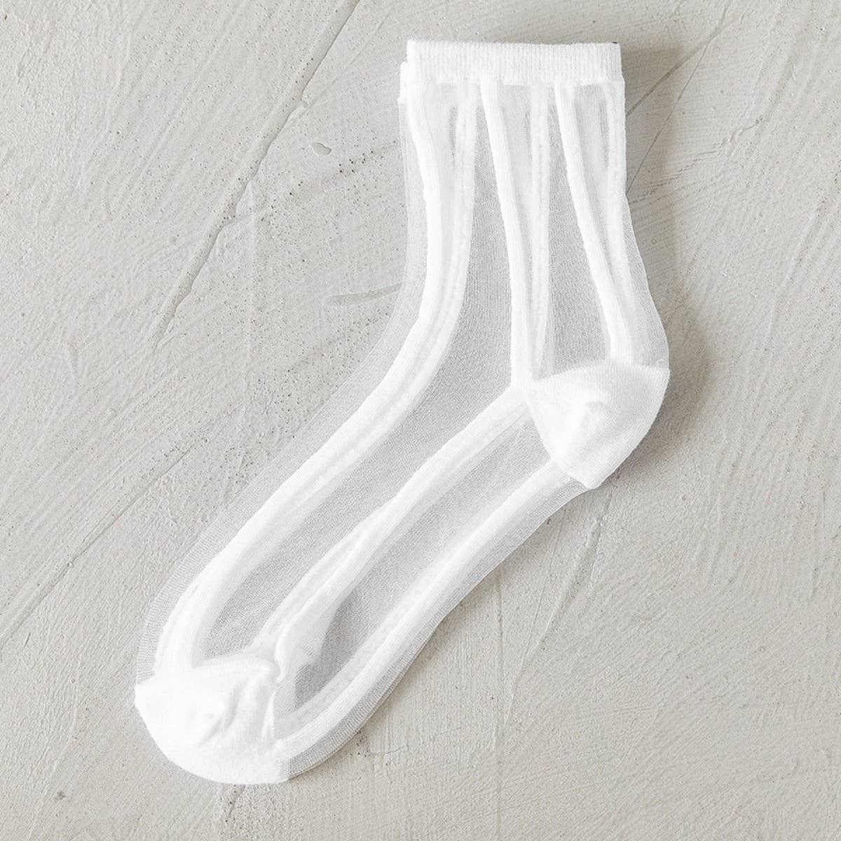 BLACK AND WHITE JACQUARD TRANSPARENT MID TUBE SOCKS_CWMS0414