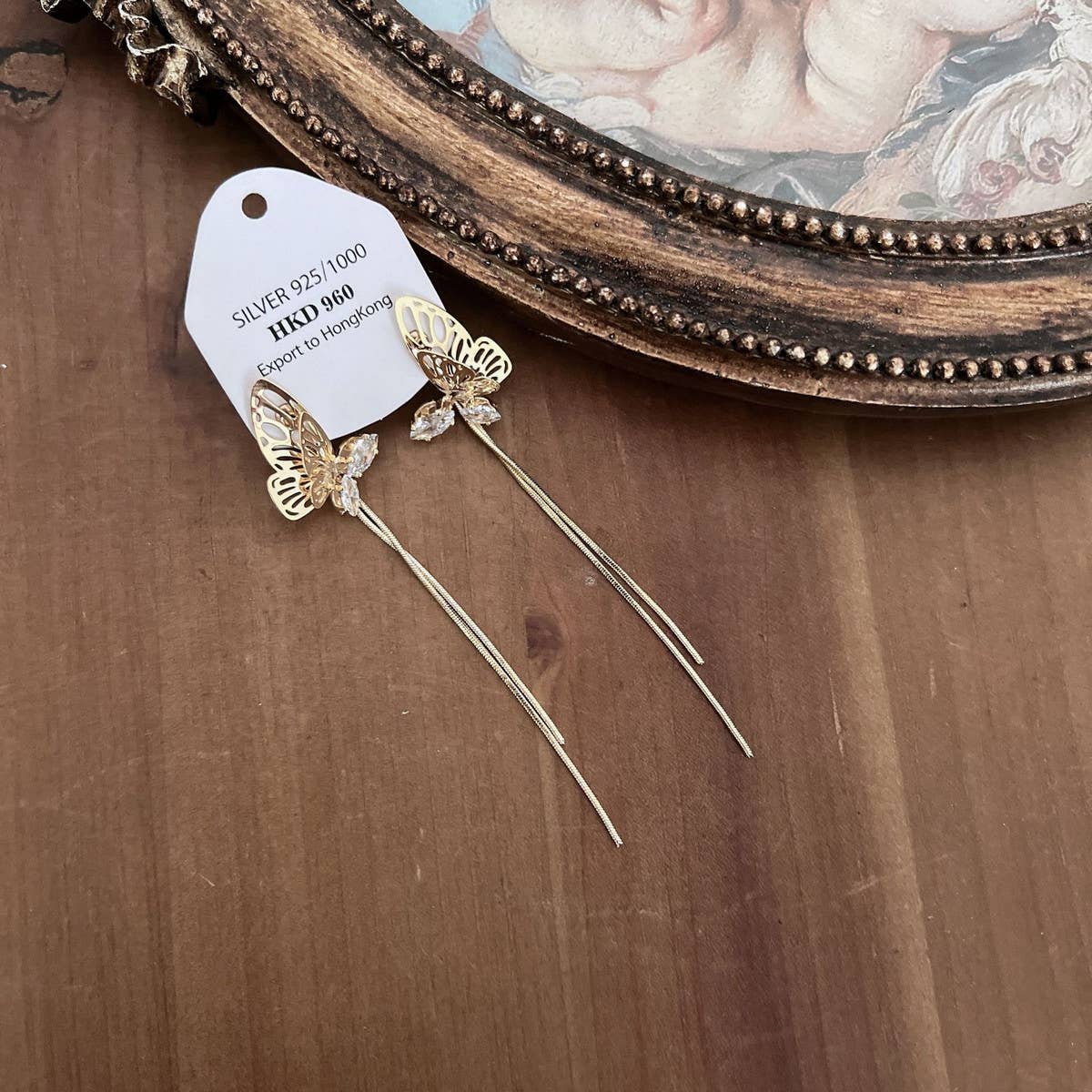 HOLLOW BUTTERFLY TASSEL EARRINGS_CWAJE1287