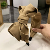 BLACK MULTI LAYERED BOW HEADBAND_CWAHA2551