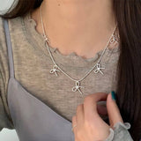 Womens Temperament Metal Bow Tassel Necklace