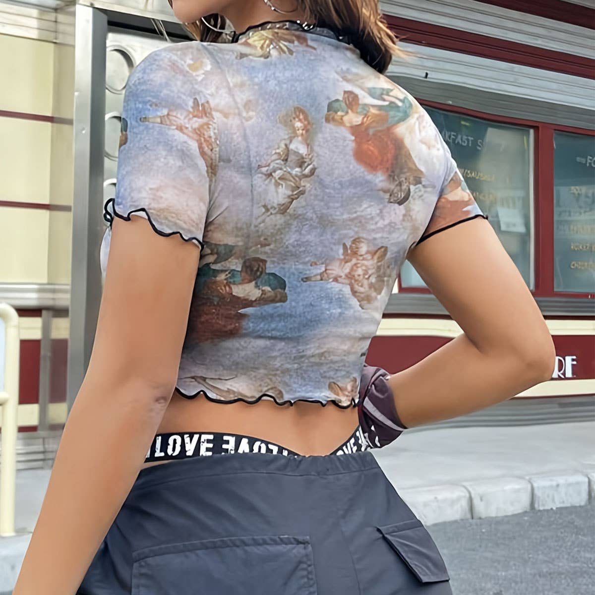 FLORAL PRINT MESH TOP WITH RUFFLE DETAILING_CWTBLS1510