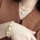 GLITTERING WAVE SHAPED NATURAL PEARL SET_CWAJE1707
