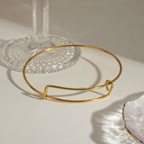 CLASSIC ADJUSTABLE 18K GOLD PLATED STEEL BANGLE_CWAJE4884