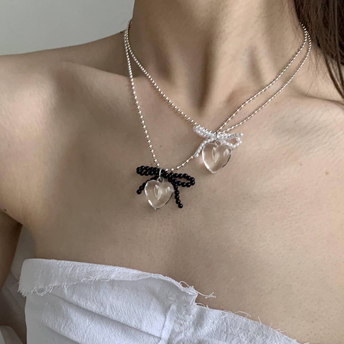 FASHION TRANSPARENT HEART PENDANT BOW NECKLACE_CWAJE3073