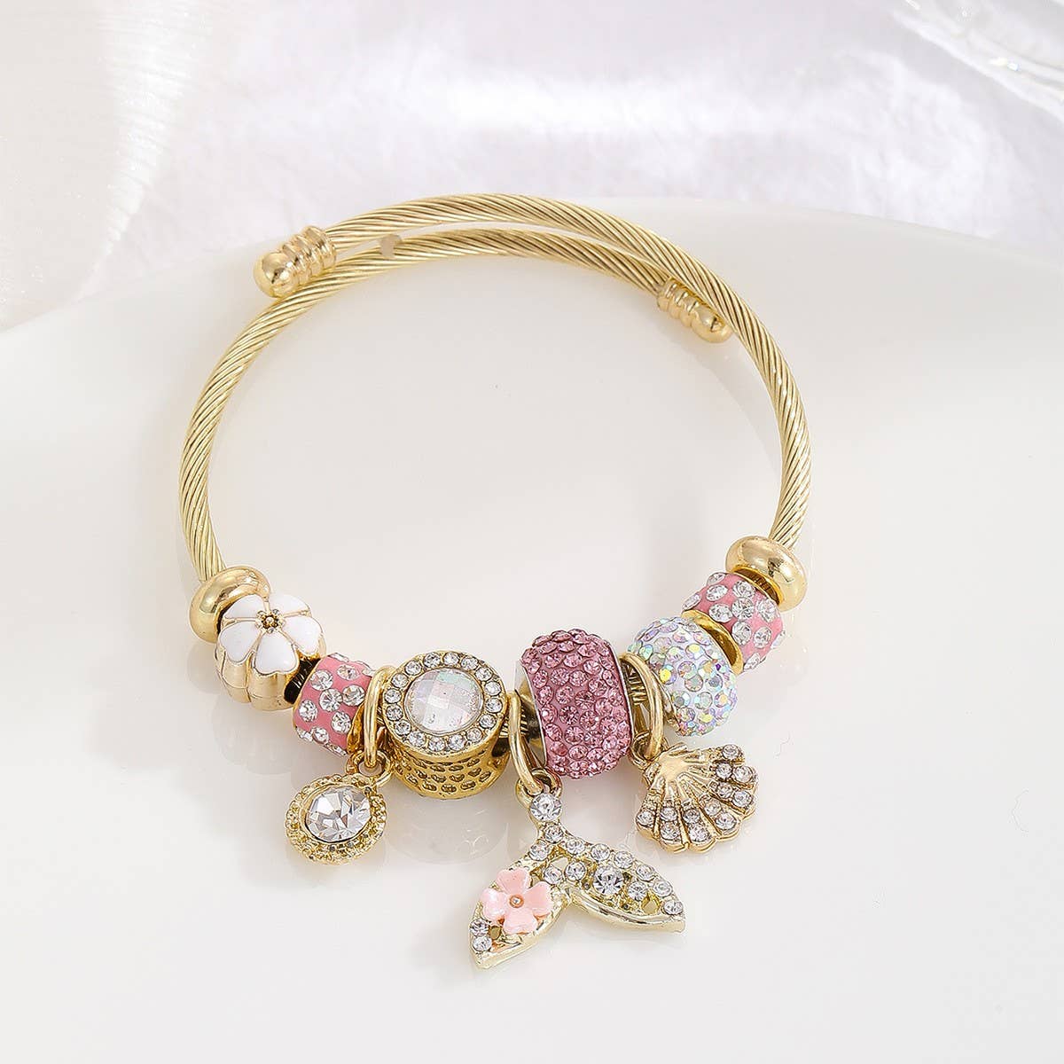 GOLD STAINLESS STEEL DOLPHIN TAIL BRACELET_CWMM8490