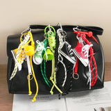 MINI CANVAS SNEAKER CHARM SPORTY GOLF STYLE_CWMM7552