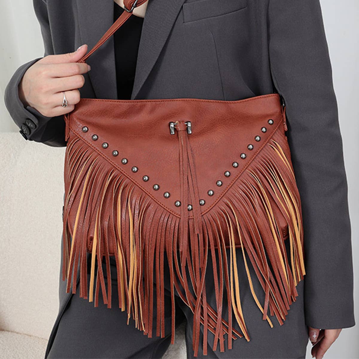 RIVET SOFT LEATHER TASSEL SHOULDER BAG_CWAB0780