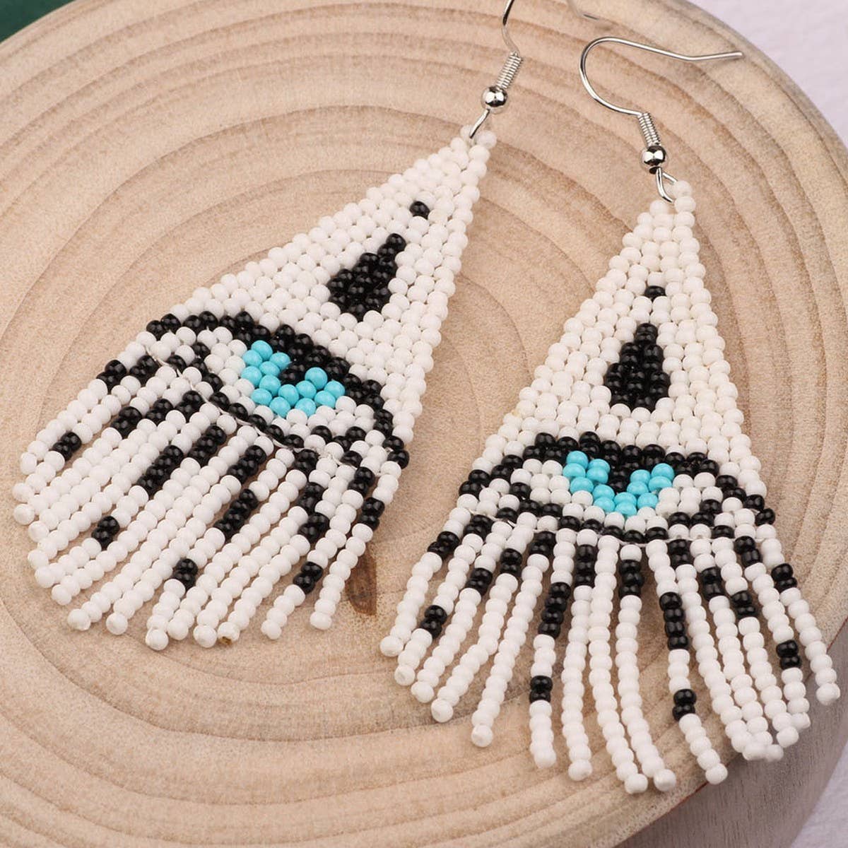 Western Devils Eye Braided Tassel Earrings