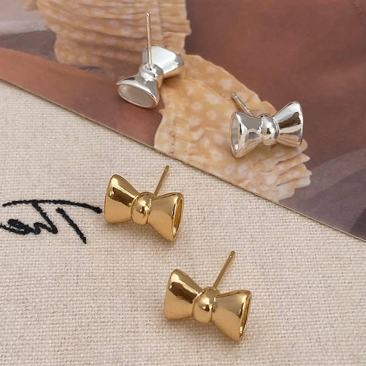 NEW VERSATILE EXQUISITE HIGH END BOW EARRINGS_CWAJE3010