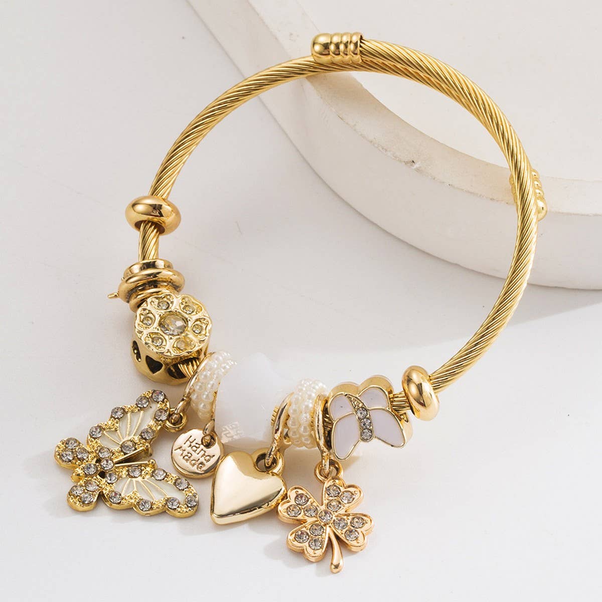 ADJUSTABLE STEEL BRACELET WITH BUTTERFLY CLOVER_CWMM8600