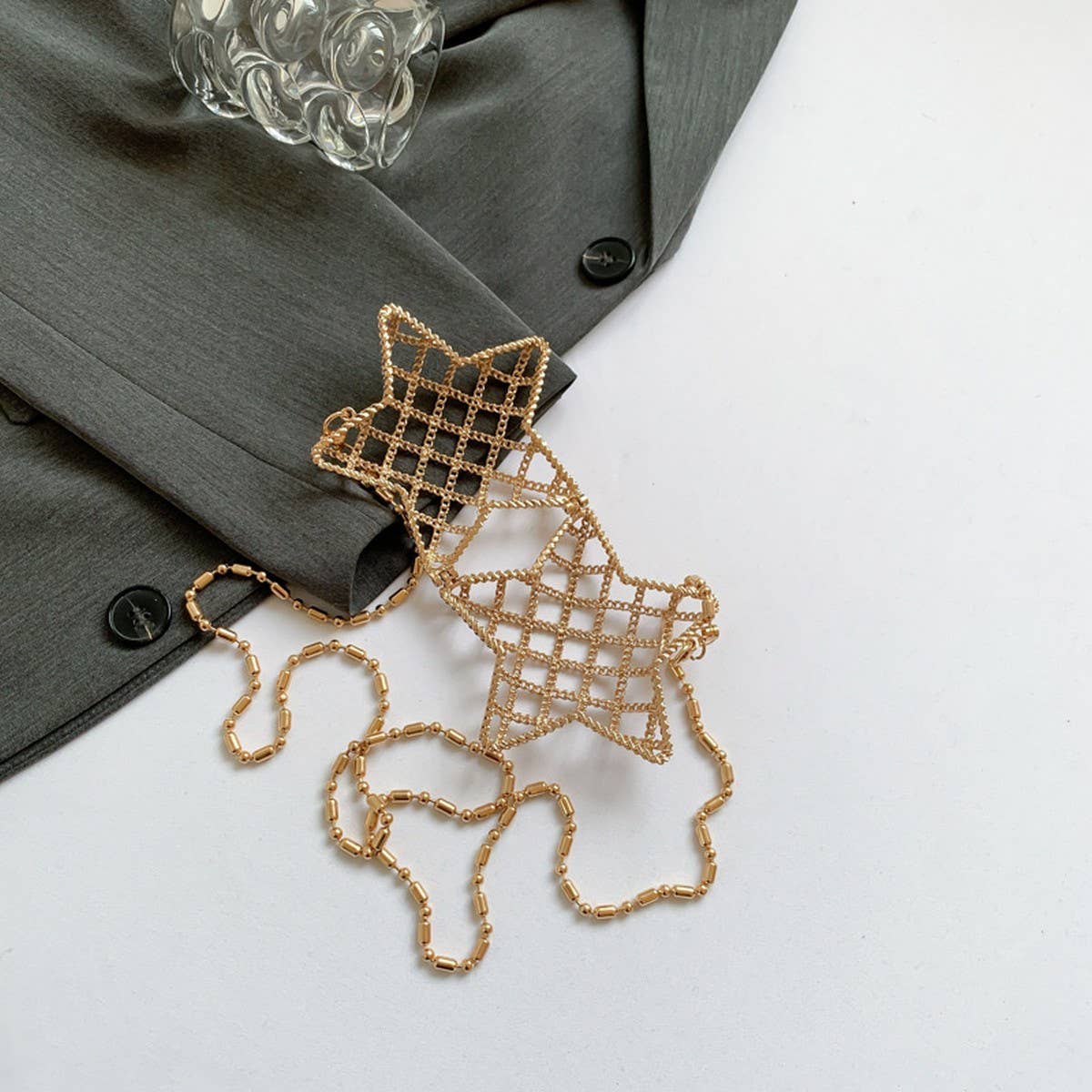 FIVE POINTED STAR HOLLOW CHAIN SQUARE CLUTCH BAG_CWAB3260