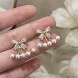 SWEET PEARL INLAID BOW ONE PAIR TWO WEAR EARRINGS_CWAJE3013