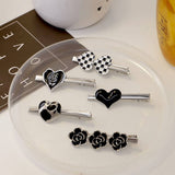 BLACK GLAZE FLOWER HEART CHECKERBOARD HAIRPIN_CWAHA4737
