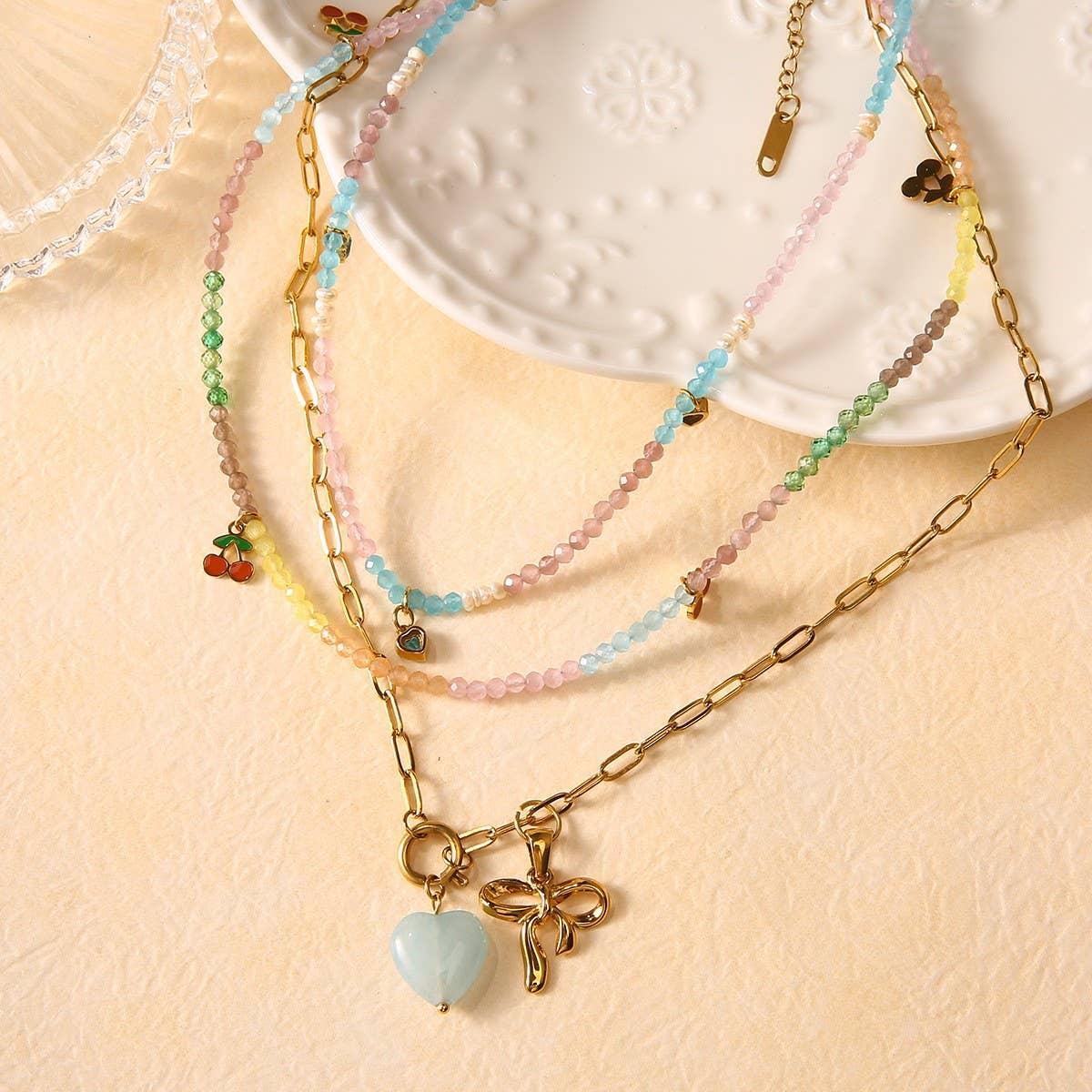 STAINLESS STEEL CHERRY NECKLACE WITH BOW CHARM_CWMM8826