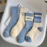 STRIPED COLOR BLOCK LETTERING SPORTS SOCKS_CWMS0964