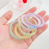 SYMPHONY CREAM TELEPHONE WIRE HAIR TIES 5 PACK_CWAHA1095