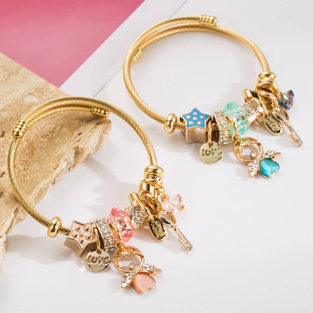 ANGEL KEY CHARM STEEL BRACELET FOR WOMEN_CWMM8474