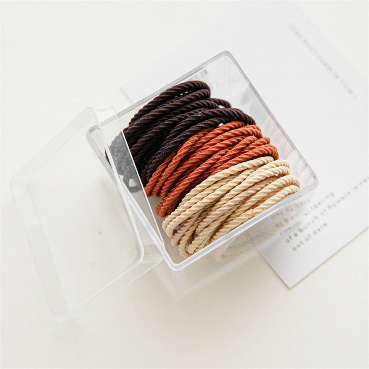 A BOX OF 50 SIMPLE AND DURABLE HAIR TIES_CWAHA1128