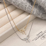 MICRO PAVED ZIRCONIA PEARL BOW PENDANT NECKLACE_CWAJE3059