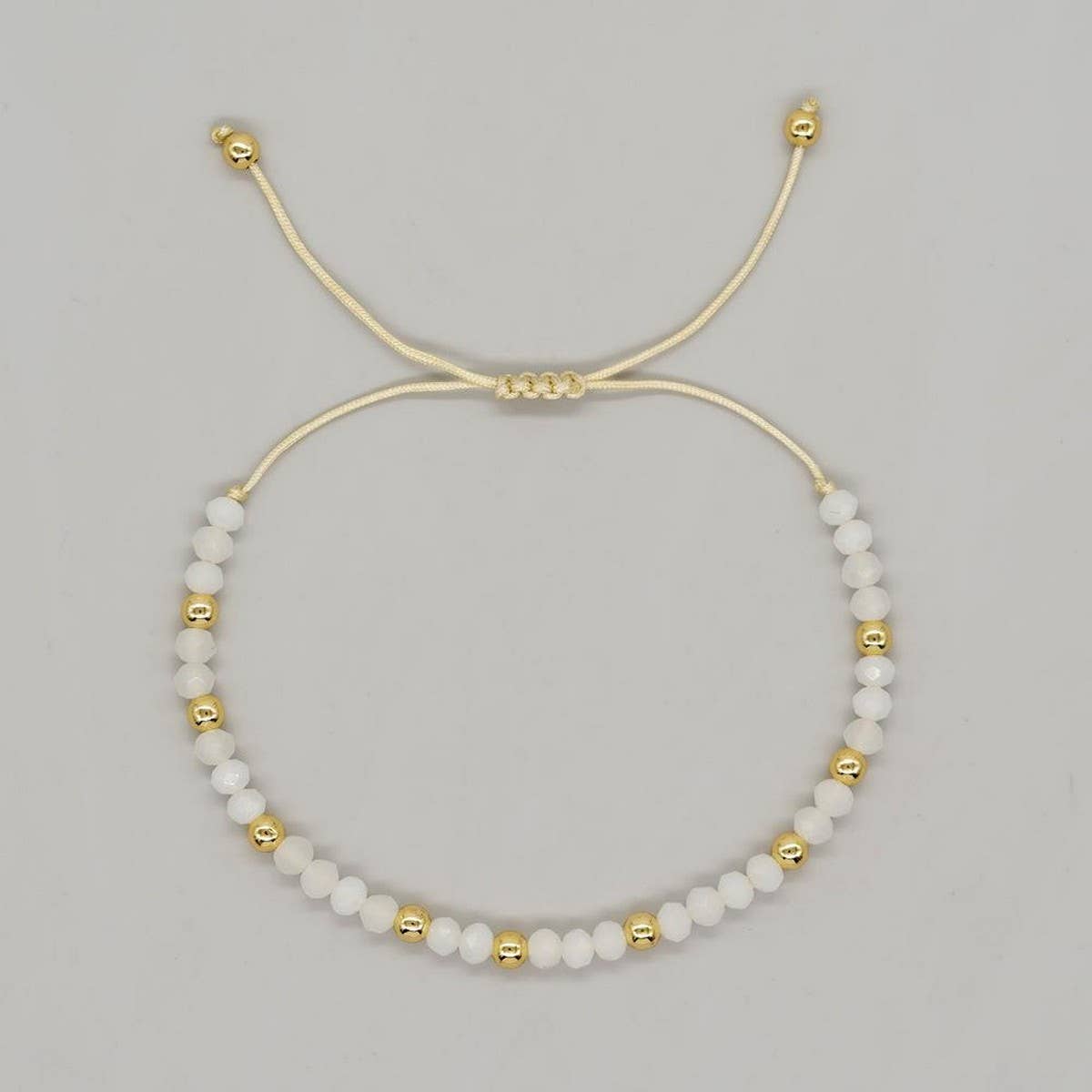 CRYSTAL GOLD BEADED HAND WOVEN BRACELET_CWMM3871