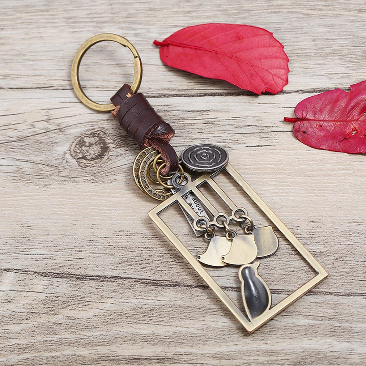 ALLOY BIRD PENDANT WOVEN LEATHER KEYCHAIN_CWMM5038