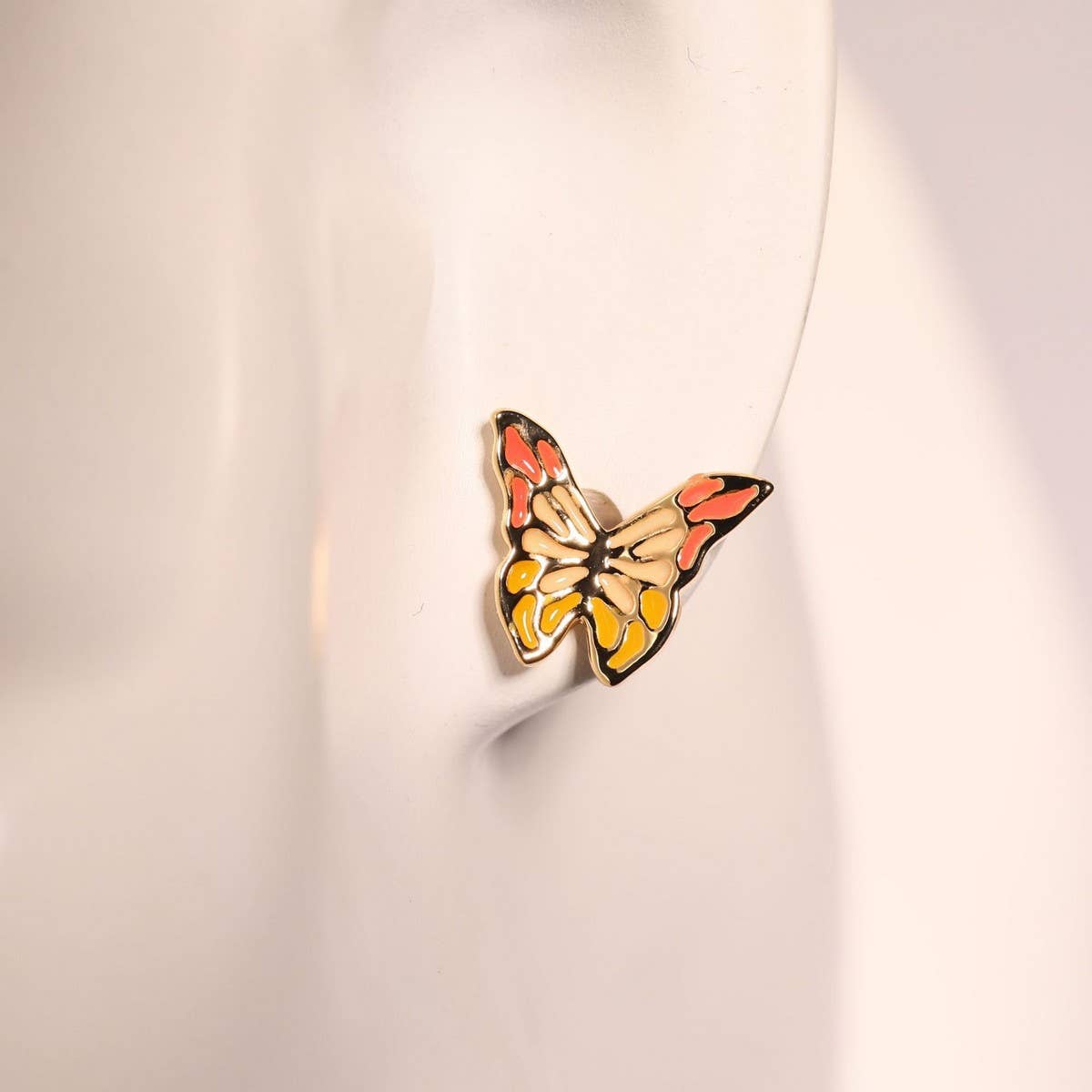 RETRO EXAGGERATED BUTTERFLY ELEMENT EARRINGS_CWMM5517