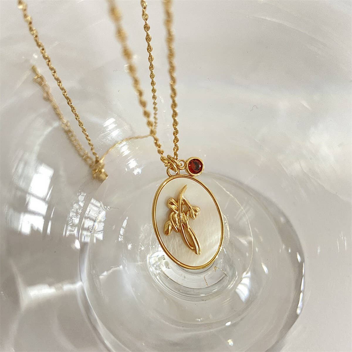 DECEMBER THREE DIMENSIONAL FLORAL OVAL NECKLACE_CWAJE1614