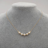 SMALL TEMPERAMENT PEARL CLAVICLE NECKLACE_CWAJE1669