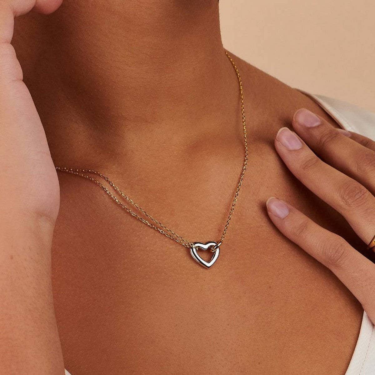 STAINLESS STEEL HEART ASYMMETRIC NECKLACE_CWMM5550