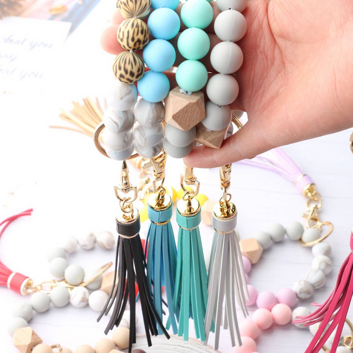 TASSEL WOOD SILICONE BEAD BRACELET KEYCHAIN_CWMM7018