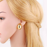 FASHIONABLE GOLD PLATED HOLLOW ROUND EARRINGS_CWAJE0991